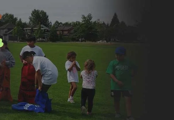 Children playing outdoors at the FHBBA martial arts summer camp